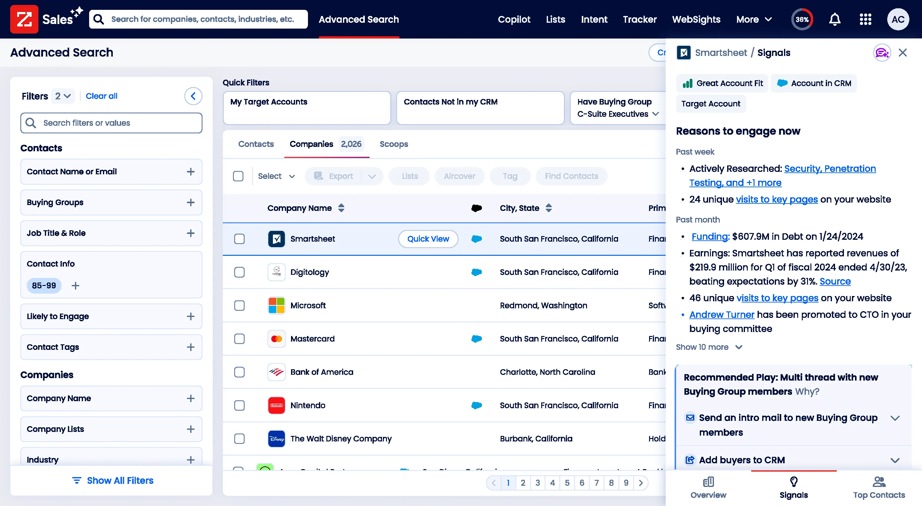 Advanced Search results list with a right-side signal detail panel for Smartsheet, showing "Reasons to engage now" with recent activity (actively researched, funding, key pages visited, executive promotion) and a "Recommended Play: Multi thread with new Buying Group members"